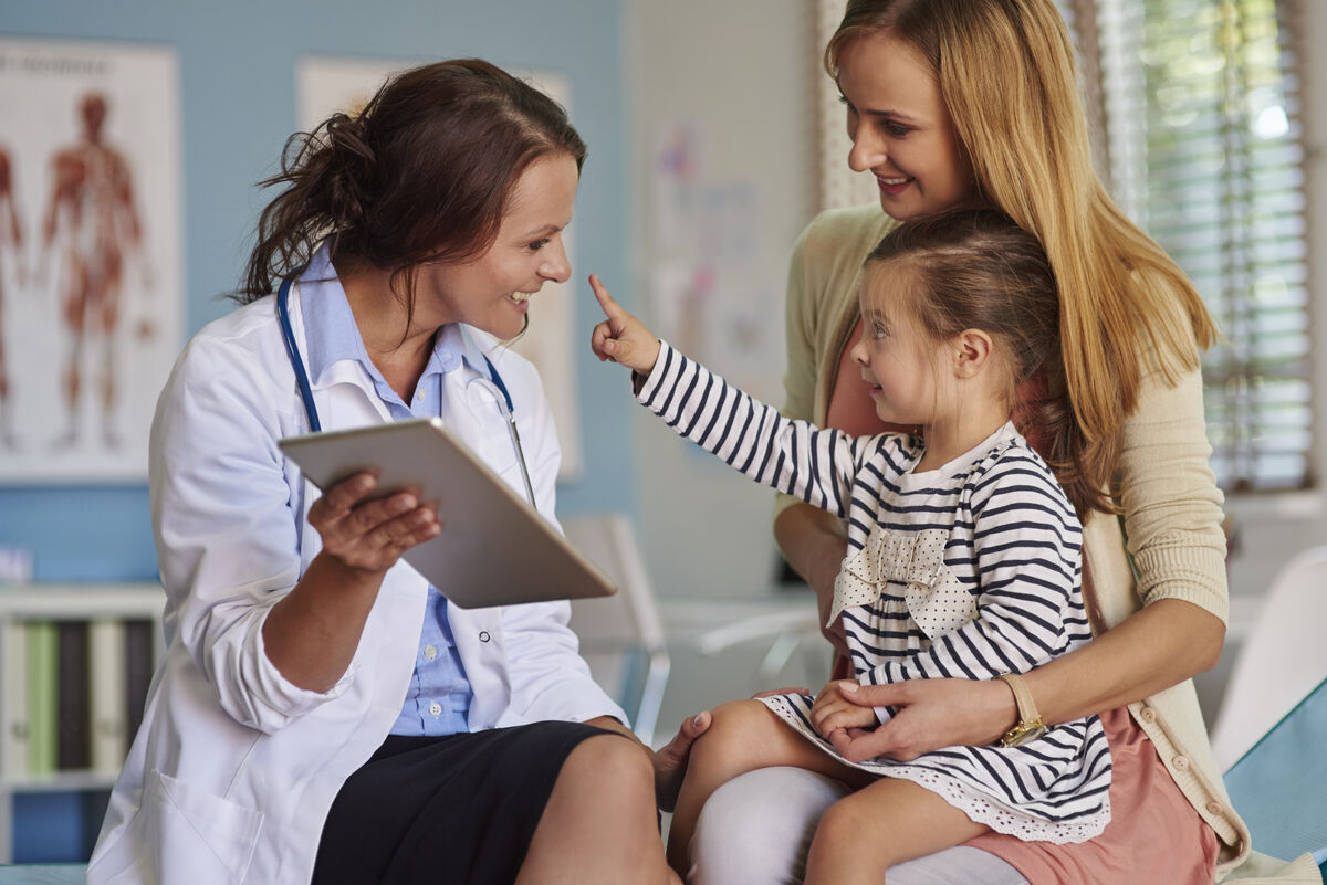Friendly doctor with patient