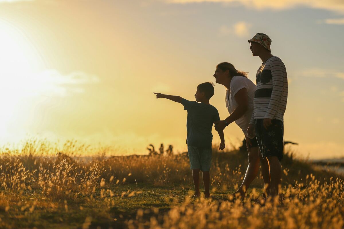 Family enjoying sunset together